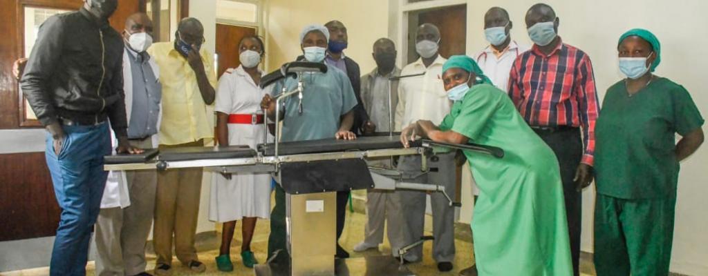 Rain water harvesting Project giving Kisoro Hospital theatre operating bed